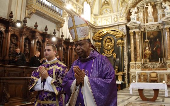 Bishop Edward K. Braxton of Belleville, Ill., leaves after concelebrating Mass with other U.S. bishops from Illinois, Indiana, and Wisconsin at the Basilica of St. John Lateran in Rome Dec. 11, 2019. The bishops were making their "ad limina" visits to the