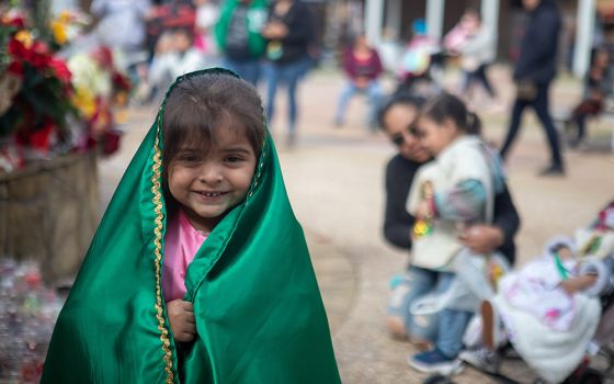 A young girl is dressed as Our Lady of Guadalupe outside Our Lady of Guadalupe Catholic Church in Houston Dec. 12, 2019. (CNS/Texas Catholic Herald/James Ramos)