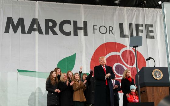 U.S. President Donald Trump applauds after addressing thousands during the 47th annual March for Life in Washington Jan. 24. (CNS/Reuters/Leah Millis)