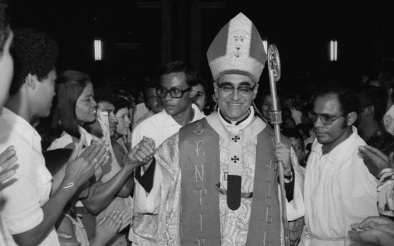 St. Archbishop Óscar Romero greets worshipers in San Salvador, El Salvador, in an undated photo. (CNS/Octavio Duran)