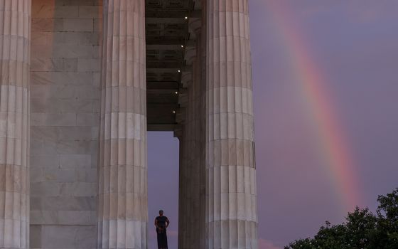 A rainbow appears behind the Lincoln Memorial in Washington June 19, 2020. The date, known as Juneteenth, honors the end to slavery in the United States and is considered the longest-running African American holiday. (CNS/Jonathan Ernst, Reuters)