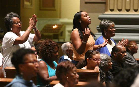 Black Catholics participate in a revival in the Cathedral Basilica of Sts. Peter and Paul in Philadelphia in this undated photo. (CNS/CatholicPhilly.com/Sarah Webb) 