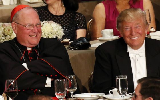 Cardinal Timothy Dolan and Donald Trump, then the Republican nominee for president, smile during the Alfred E. Smith Memorial Foundation Dinner in New York City Oct. 20, 2016. (CNS/Gregory A. Shemitz)
