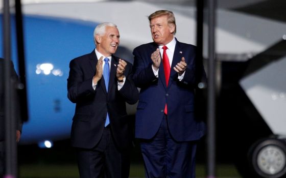 President Donald Trump and Vice President Mike Pence arrive at a campaign rally in Newport News, Virginia, Sept. 25. (CNS/Reuters/Tom Brenner)