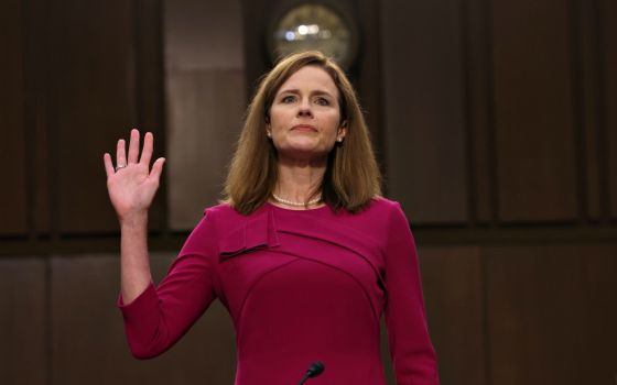 Judge Amy Coney Barrett, President Donald Trump's nominee for the U.S. Supreme Court, is sworn in for her confirmation hearing before the Senate Judiciary Committee on Capitol Hill in Washington Oct. 12. (CNS/Win McNamee, Pool via Reuters)
