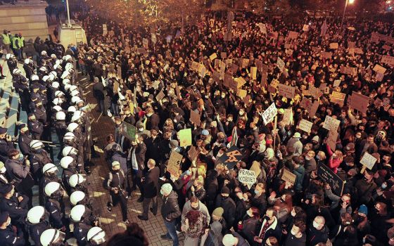 Demonstrators protest Oct. 25, 2020, in front of the Cathedral of Christ the King in Katowice, Poland, against the ruling by Poland's Constitutional Tribunal that imposes a near-total ban on abortion. Many young Polish women protested in November against 