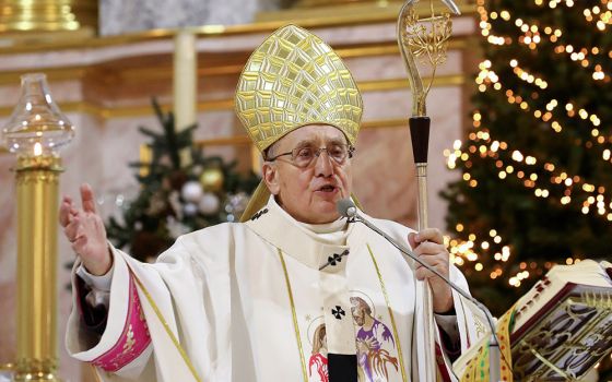 Archbishop Tadeusz Kondrusiewicz of Minsk, Belarus, celebrates Christmas Mass at his cathedral following his return to Minsk Dec. 24, 2020. (CNS/Stringer, Reuters)
