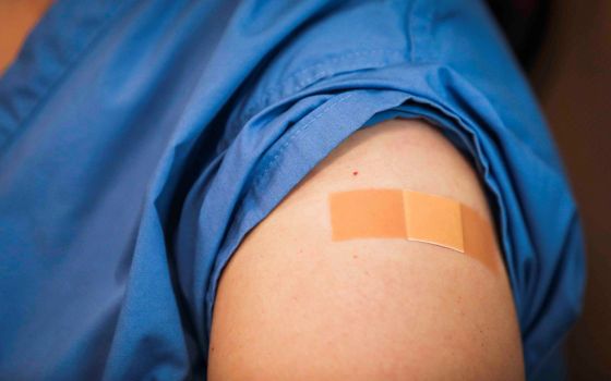 A Band-Aid is seen on the arm of a COVID-19 vaccinated person at Boston Medical Center Dec. 16, 2020. (CNS/Erin Clark, Pool via Reuters)