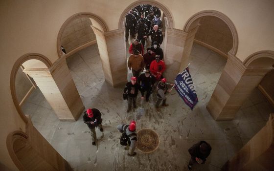 Supporters of President Donald Trump storm the U.S. Capitol in Washington Jan. 6, after a rally to contest the certification of the 2020 presidential election. (CNS/Ahmed Gaber, Reuters)