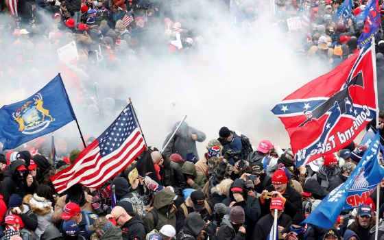 Tear gas is released into a crowd of demonstrators protesting the 2020 election results at the U.S. Capitol in Washington Jan. 6, 2021. (CNS photo/Shannon Stapleton, Reuters)