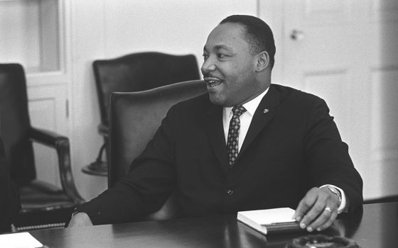 Civil rights leader the Rev. Martin Luther King Jr. smiles during a talk with U.S. President Lyndon B. Johnson, not pictured, in this undated photo. The federal holiday that celebrates the iconic civil rights leader is observed Jan. 18. (CNS/Yoichi Okamot