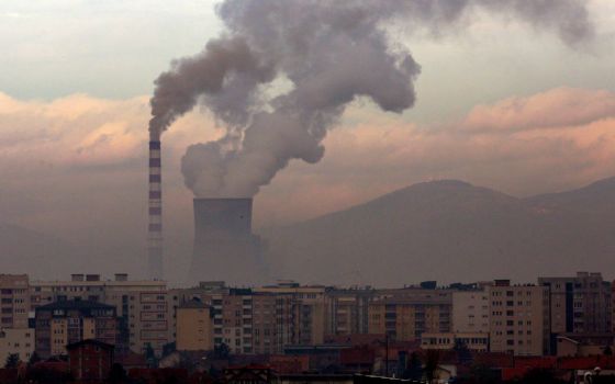 Smoke rises from a coal-fired power plant in Obilic, Kosovo, Nov. 18, 2019. Alok Sharma, U.K. president for COP26, said it's his goal that the upcoming United Nations climate summit will "consign coal power to history." (CNS photo/Reuters)