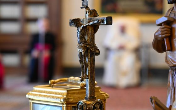A crucifix is pictured as Pope Francis leads his general audience in the library of the Apostolic Palace at the Vatican April 14. Italy's highest court of appeal has ruled that public school classrooms can approve the presence of the crucifix.