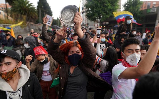 Demonstrators participate in a protest against poverty and police violence May 4 in Bogota, Colombia. (CNS/Nathalia Angarita, Reuters)