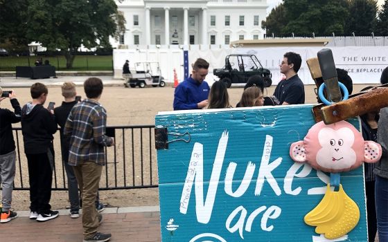 A sign denouncing nuclear weapons is seen near the White House in Washington Oct. 25, 2019. (CNS photo/Tyler Orsburn)