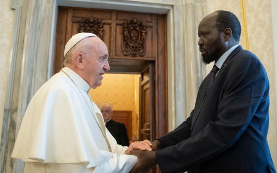 Pope Francis shakes hands with South Sudanese President Salva Kiir during a private audience at the Vatican March 16, 2019. (CNS/Vatican Media)