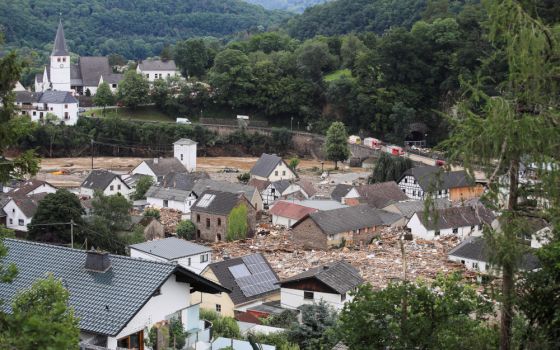 Debris surrounds homes following flooding in Schuld, Germany, July 15, 2021. Pope Francis offered prayers and expressed his closeness to the people of Germany after severe flooding in the western part of the country claimed more than 80 lives. (CNS photo)