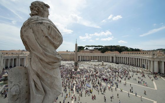 People gather in St. Peter's Square at the Vatican July 4, 2021, for the Angelus prayer with Pope Francis. The Vatican recently released the names of two commissions charged with assisting the leaders of the Synod of Bishops' general secretariat in review
