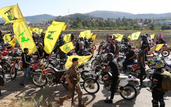 Supporters of Lebanese Hezbollah leader Sayyed Hassan Nasrallah gather in a convoy of motorcycles in the Lebanese village of Kfar Kila, near the border with Israel, May 25, 2021. Cardinal Bechara Rai, Maronite patriarch, has called for the Lebanese Armed 