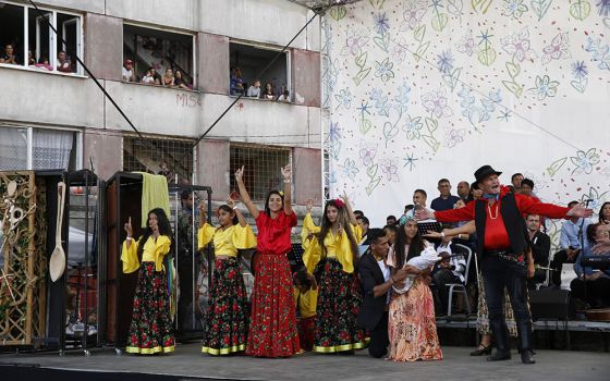  Performers entertain before Pope Francis' meeting with the Roma community in the Luník IX neighborhood in Košice, Slovakia, Sept. 14. (CNS/Paul Haring)