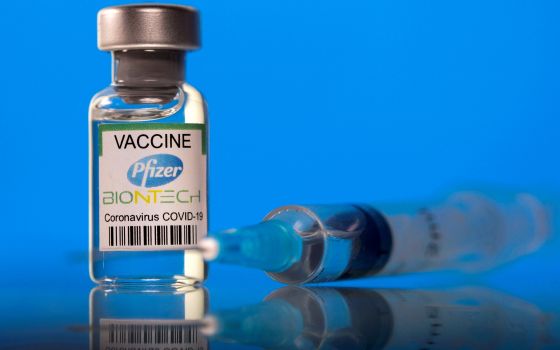A vial labeled with the Pfizer-BioNTech COVID-19 vaccine is seen in this illustration photo. (CNS photo/Dado Ruvic, Reuters)