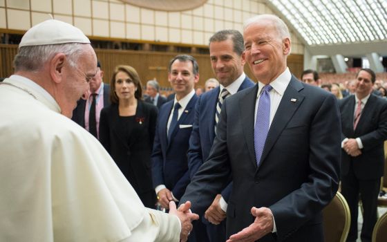 Pope Francis greets then-U.S. Vice President Joe Biden after both spoke at a conference on adult stem cell research at the Vatican April 29, 2016. In a recent interview, Archbishop Christophe Pierre, the Vatican ambassador to the U.S., said he is helping 