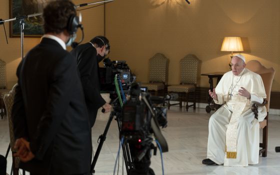 Pope Francis is interviewed at the Vatican for "Stories of a Generation," a Netflix series based on the pope's book, "Sharing the Wisdom of Time."  (CNS photo/Simone Risoluti, Vatican Media)