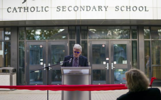 Peter Cassidy, principal at John Paul II Secondary School, speaks at the ribbon-cutting ceremony for the newly retrofitted carbon-neutral school in London, Ontario, Nov. 2. (CNS photo/courtesy Raymond Garcia, via Catholic Register)