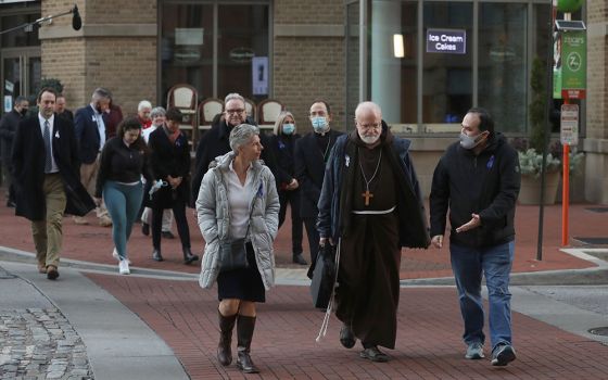 Cardinal Sean O'Malley of Boston, president of the Pontifical Commission for the Protection of Minors, joins a sunrise walk to end abuse Nov. 18 in Baltimore. (CNS/Bob Roller)