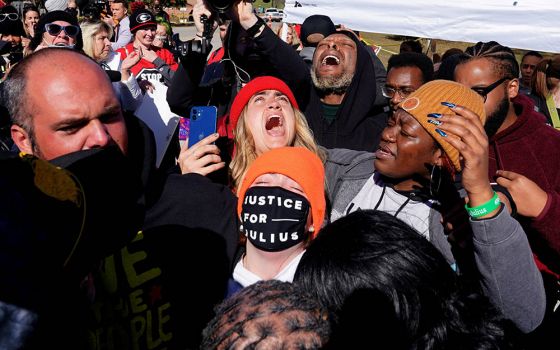 Demonstrators in McAlester, Oklahoma, rejoice after Gov. Kevin Stitt granted clemency for Julius Jones Nov. 18, just hours before he was scheduled to be executed. (CNS/Reuters/Nick Oxford)