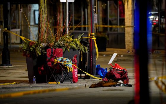 Chairs left abandoned are seen Nov. 22, 2021, after a car plowed through the Waukesha Christmas Parade in Waukesha, Wis., at about 4:39 p.m. local time Nov. 21. (CNS photo/Cheney Orr, Reuters)