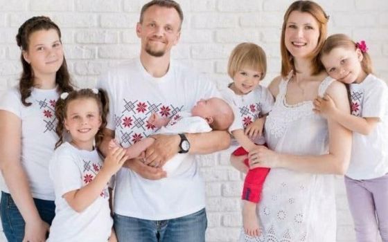 Volha Zalatar, a Catholic, pictured in an undated photo with her husband and five children, was sentenced in Belarus to four years in jail for forming an "extremist group" and public order offenses, despite testimony by her lawyer that she'd been tortured