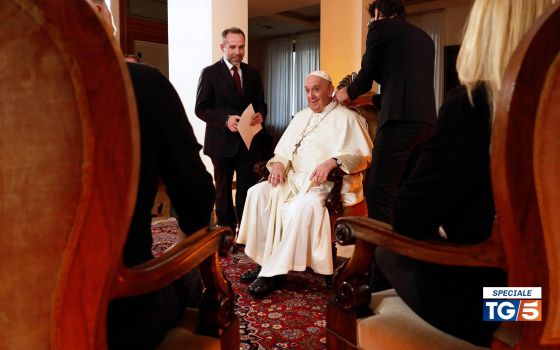 Pope Francis is interviewed at his Vatican residence by adults facing challenging experiences in their lives for a program broadcast on Italian television Channel 5, Mediaset, Dec. 19, 2021. (CNS photo/courtesy Mediaset)