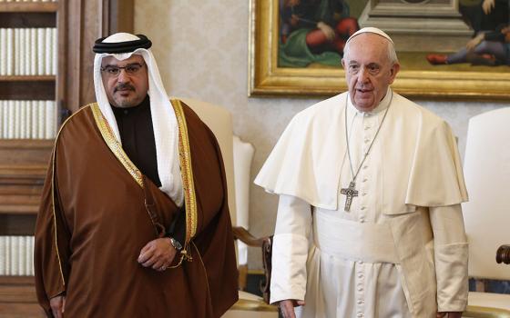 Pope Francis walks with Salman bin Hamad Al Khalifa, crown prince of Bahrain, during a private audience at the Vatican in this Feb. 3, 2020, file photo. (CNS/Paul Haring)