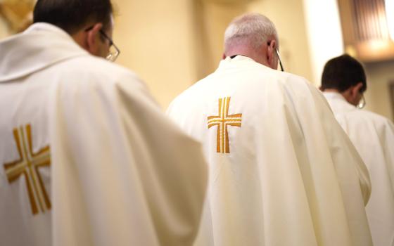 Priests are seen during a special Mass for vocations at Cure of Ars Church in Merrick, N.Y., Aug. 4, 2022, the feast of St. John Vianney, patron of parish priests. (CNS photo/Gregory A. Shemitz)