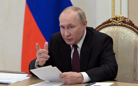 Russian President Vladimir Putin addresses heads of security and intelligence agencies of the Commonwealth of Independent States via a video link in Moscow Oct. 26, 2022. 