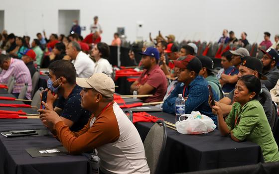 Members of the Farm Labor Organizing Committee take part in the group's convention in September in Toledo, Ohio. (Matt Emmick) 