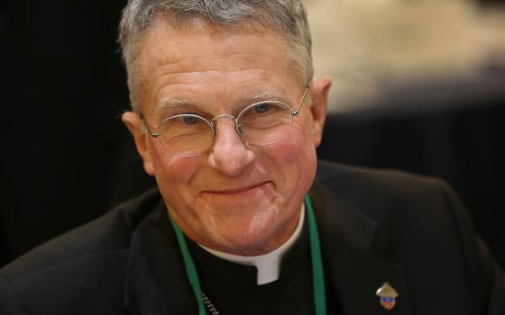 Archbishop Timothy Broglio of the U.S. Archdiocese for the Military Services smiles Nov. 15 after being elected president of the U.S. Conference of Catholic Bishops during a session of the fall general assembly of the bishops in Baltimore. (CNS/Bob Roller)