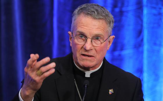 Archbishop Timothy Broglio of the U.S. Archdiocese for the Military Services, gestures during a Nov. 15 news conference after being elected president of the U.S. Conference of Catholic Bishops during the fall general assembly of the bishops in Baltimore. (CNS/Bob Roller)