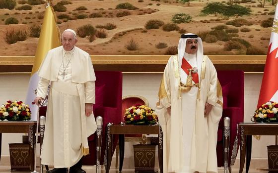 Pope Francis is greeted by Bahrain's King Hamad bin Isa Al Khalifa as he arrives Nov. 3 at the Sakhir Royal Palace, Bahrain. (AP photo/Alessandra Tarantino)