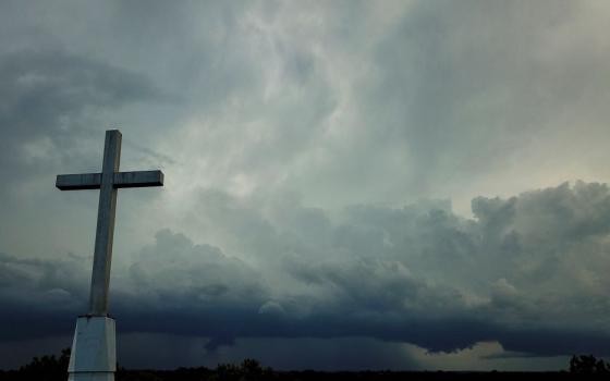 Storm clouds approach a church in Mequon, Wis., on Sunday, Aug. 2, 2020. (AP/Morry Gash)