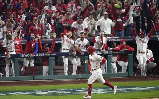 Philadelphia Phillies' Rhys Hoskins rounds the bases after a two-run home run during the fifth inning in Game 3 of baseball's World Series between the Houston Astros and the Philadelphia Phillies on Nov. 1 in Philadelphia. (AP/Matt Rourke)