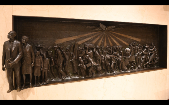 A bas relief sculpture seen Sept. 17 on the wall of the Our Mother of Africa Chapel at the Basilica of the National Shrine of the Immaculate Conception in Washington depicts the African American experience from slavery to emancipation and the civil rights movement. (CNS)