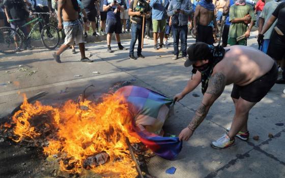 Protester burns Indigenous flag in Bolivia
