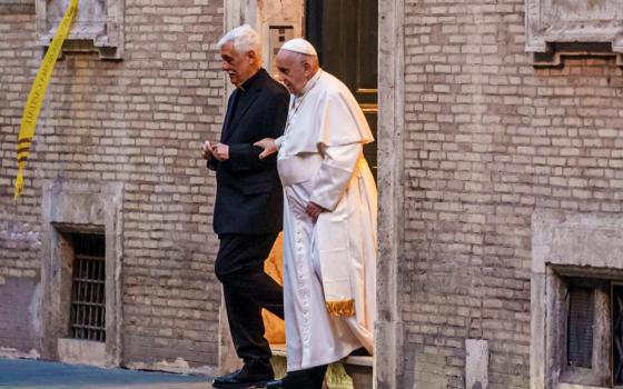 Pope Francis and Jesuit superior leave church