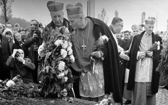 Cardinal Stefan Wyszynski of Warsaw and Cardinal Karol Wojtyla of Krakow, the future Pope John Paul II, and Cardinal John Krol of Philadelphia are pictured at a ceremony Oct. 15, 1972, in Brzezinka, Poland. (CNS)