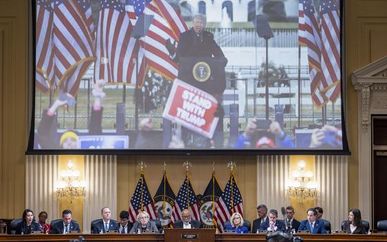 A video of former President Donald Trump is shown on a screen, as the House select committee investigating the Jan. 6 attack on the U.S. Capitol holds its final meeting on Capitol Hill in Washington Dec. 19. (Jim Lo Scalzo/Pool Photo via AP)