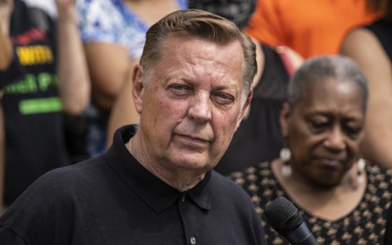 Father Michael Pfleger speaks during a news conference outside St. Sabina Church in Chicago, May 24, 2021. Pfleger has been reinstated as leader of his parish after being cleared by church officials of allegations that he sexually abused a minor decades ago. The Chicago Archdiocese released a letter Saturday, Dec. 10, 2022 saying that a review board found “no reason to suspect” that the Rev. Michael Pfleger was guilty of the allegations. (Ashlee Rezin Garcia/Chicago Sun-Times via AP, file)