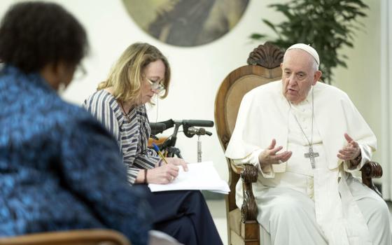 Pope Francis speaks during a November interview with staff of America. (America Media/Antonello Nusca)