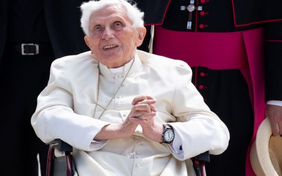 Retired Pope Benedict XVI smiles at Germany's Munich Airport before his departure to Rome June 22, 2020. (CNS/Reuters/Sven Hoppe)